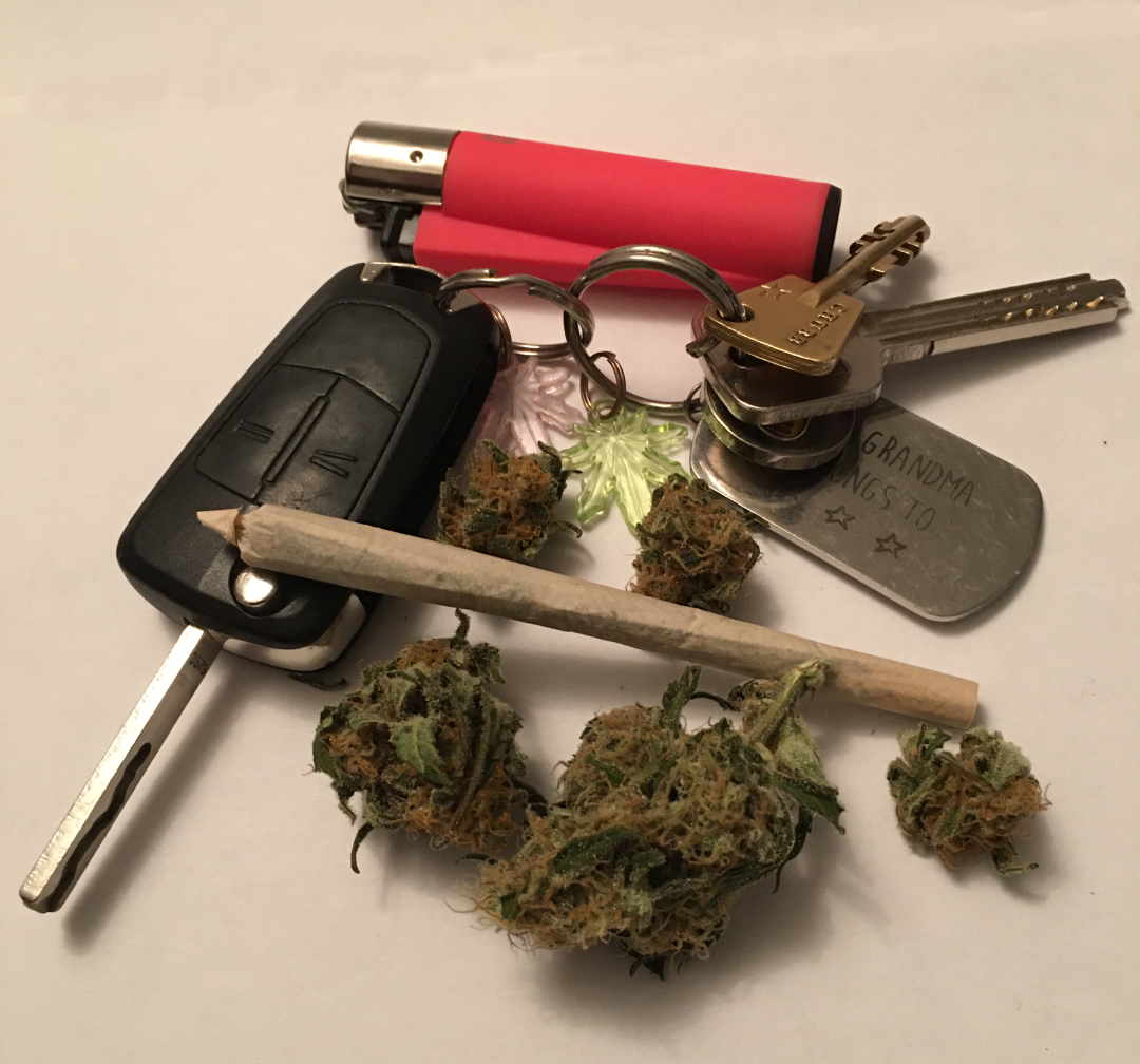 Car keys Cannabis and a lighter